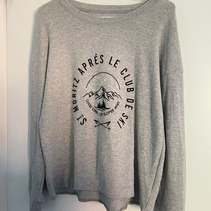This is a grey crewneck. It is from American Eagle and is a size medium